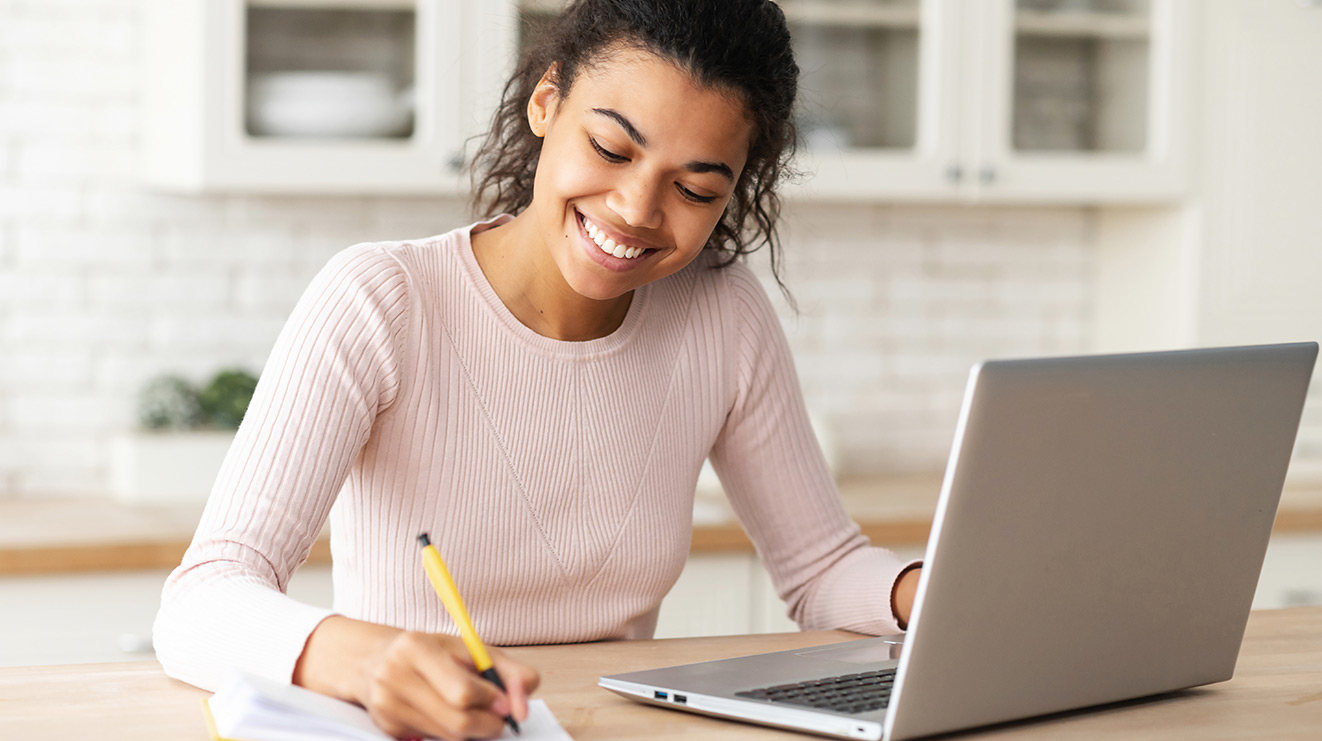 Young Teacher taking notes